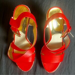Michael Kors red leather wedges with gold accents